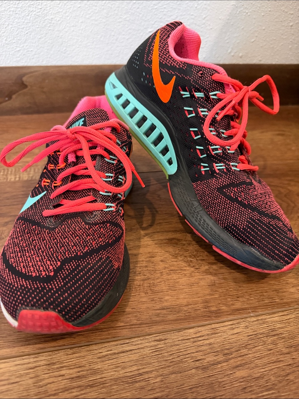 Nike Women's Black Running Shoes with Pink, Teal & Orange Accents